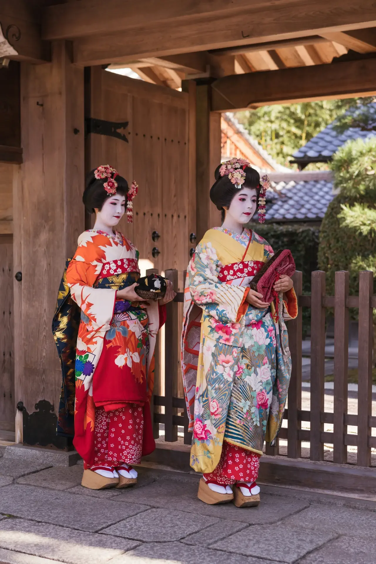 Maiko and Geisha walking in Kyoto