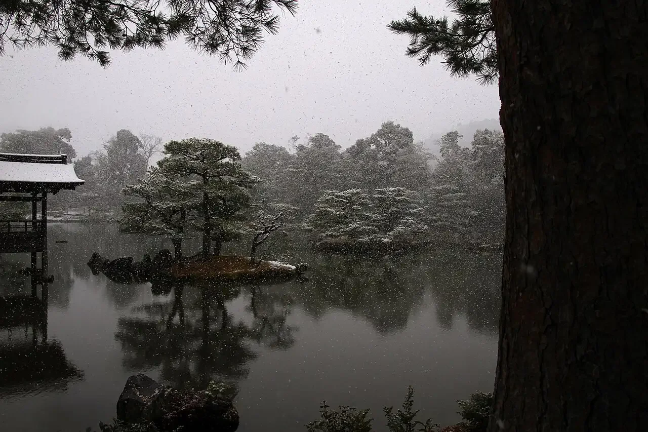 Snowing over Kikaku-ji gardens Lake Snowing over Kikaku-ji gardens Lake